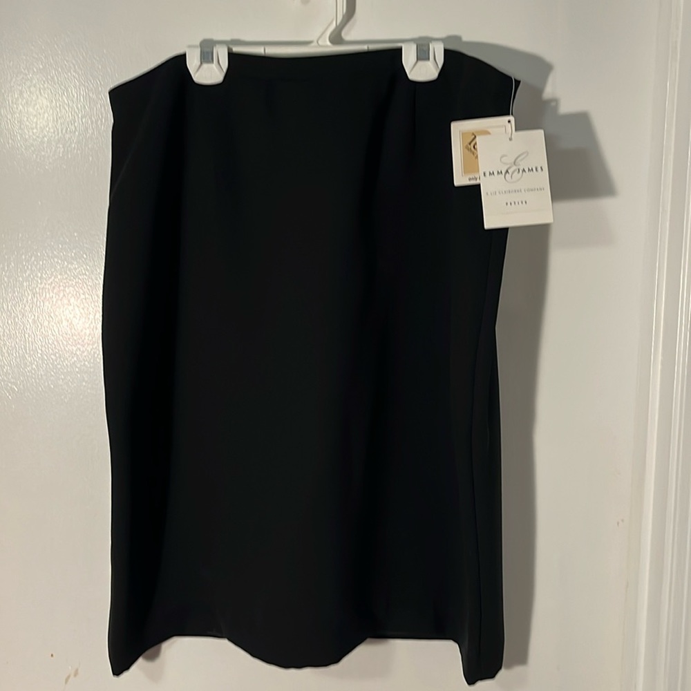 New with tags.  Classic black pencil skirt by Emma James. Size 16